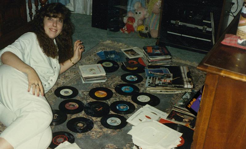 Laurie Kramer with her record collection. West Financial Services.
